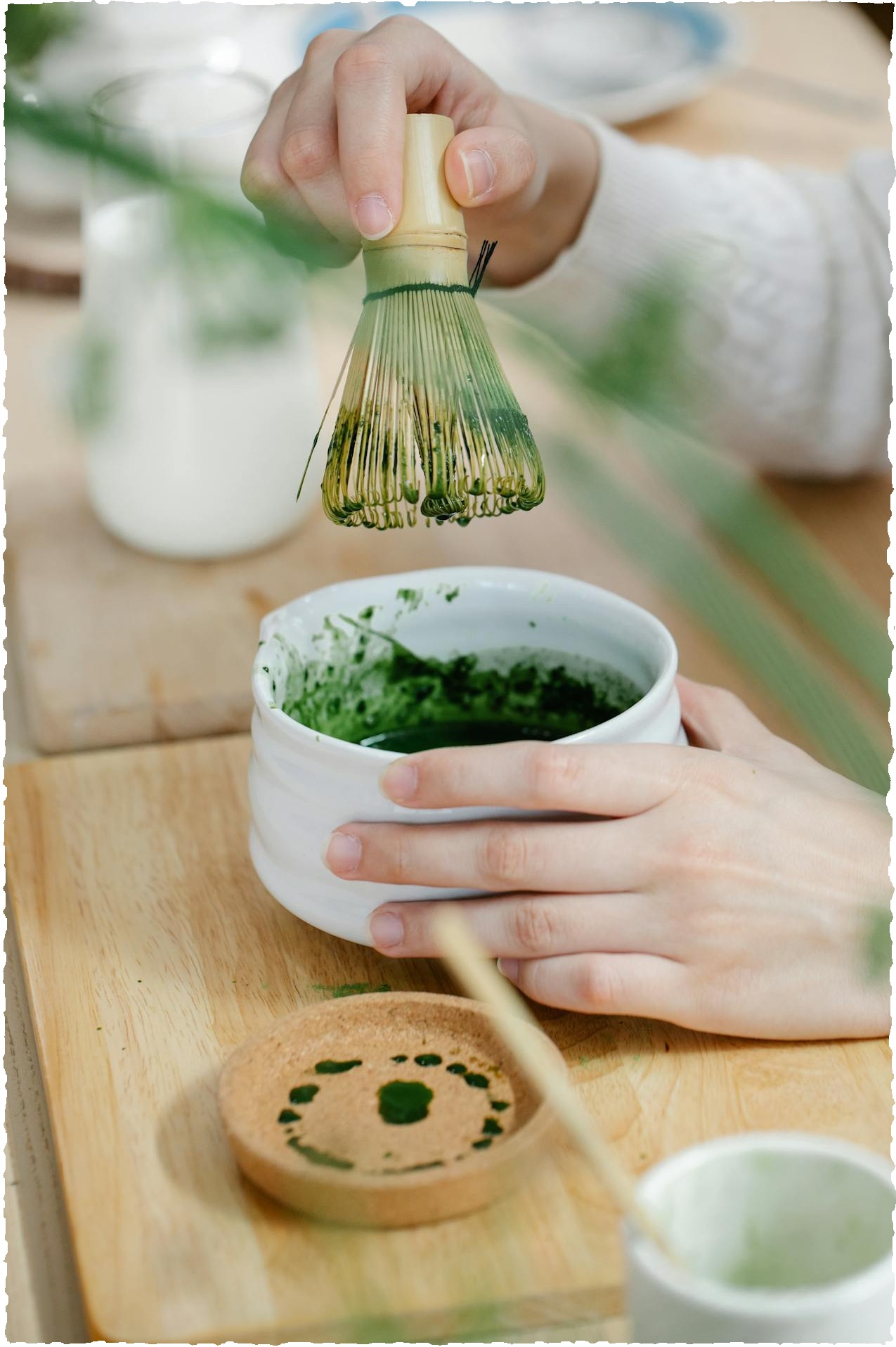 Close-up of Person Making Matcha