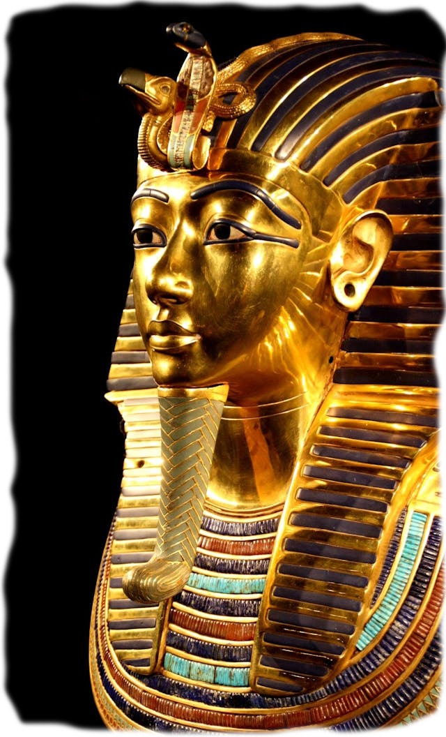 A gold statue of a pharaoh