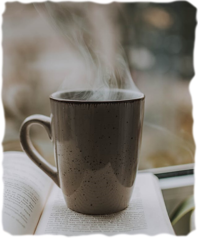 A cup of coffee on a book