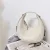 Mini sac à main demi-lune coréen pour femme, sac sous les bras en cuir de vachette à la mode, design de marque, été, 2023Mini sac à main demi-lune coréen pour femme, sac sous les bras en cuir de vachette à la mode, design de marque, été, 2023